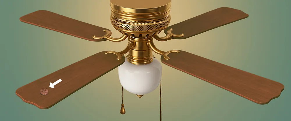 Glue the penny to the fan blade